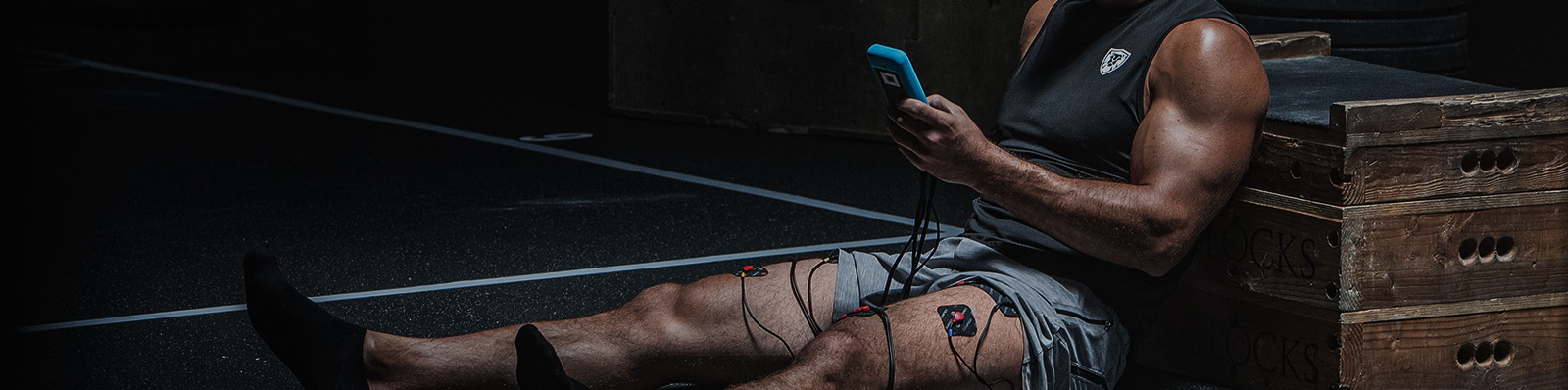 Athlete using edge muscle stim
