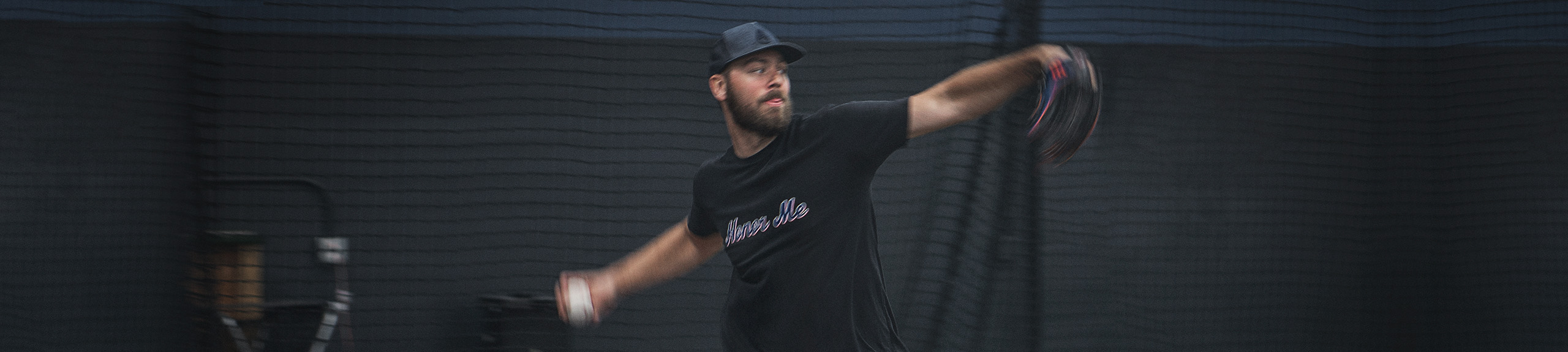 Baseball player throwing a baseball
