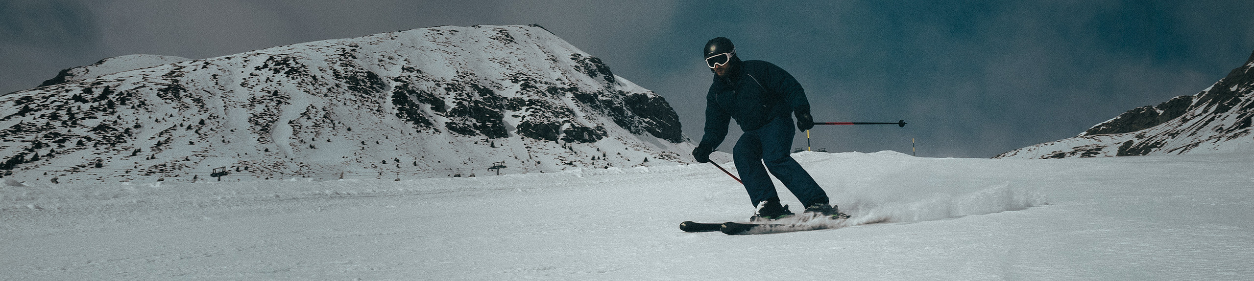 skier skiing down the hill