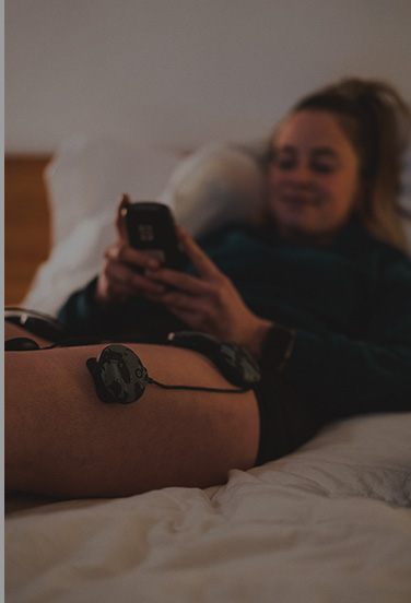 skier recovering using muscle stim